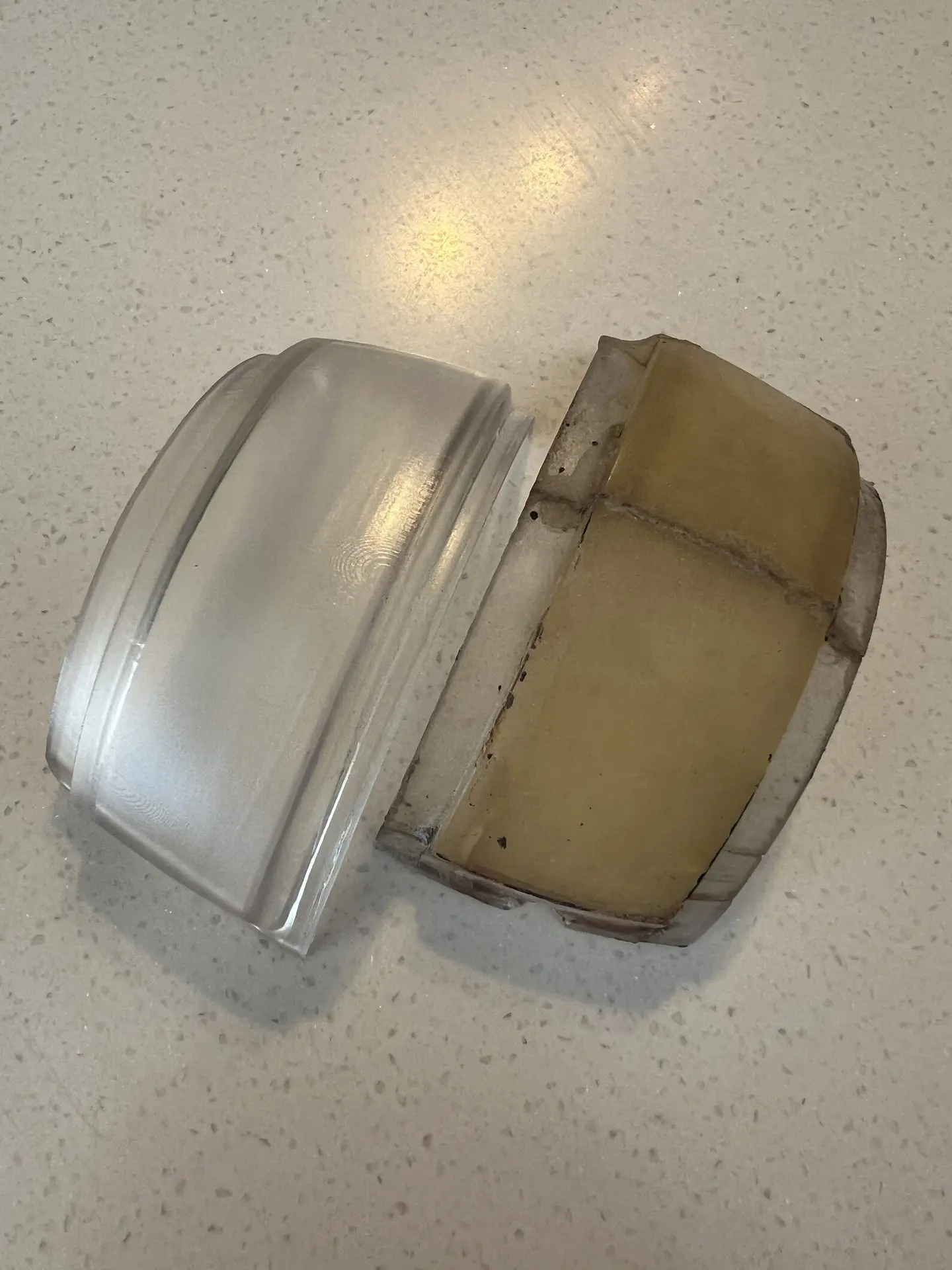 Cadillac number plate light lens printed in IND 405 clear