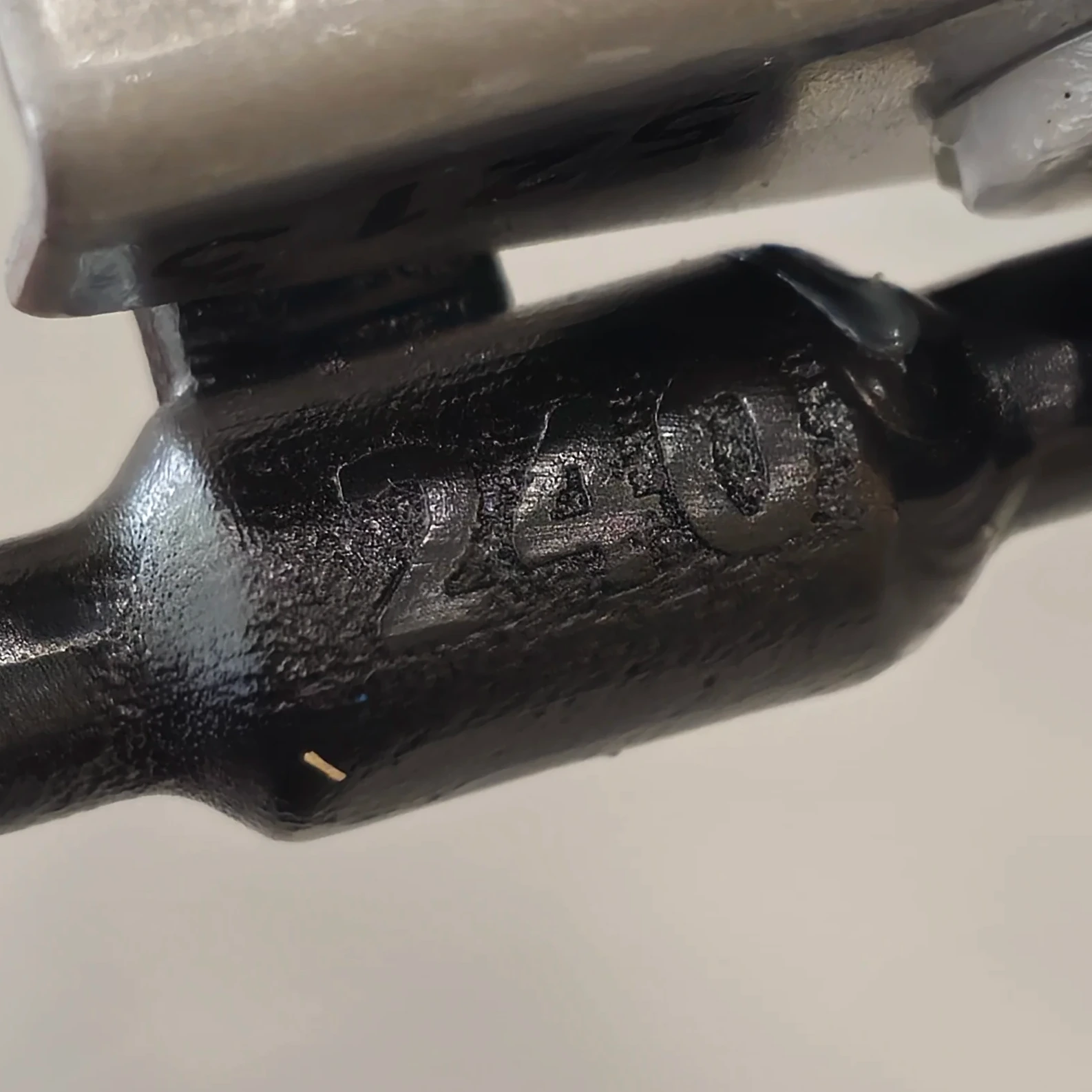 Close-up of 240 stamped into the rod of IEE-0240, the S13 adapted drive-by-wire pedal